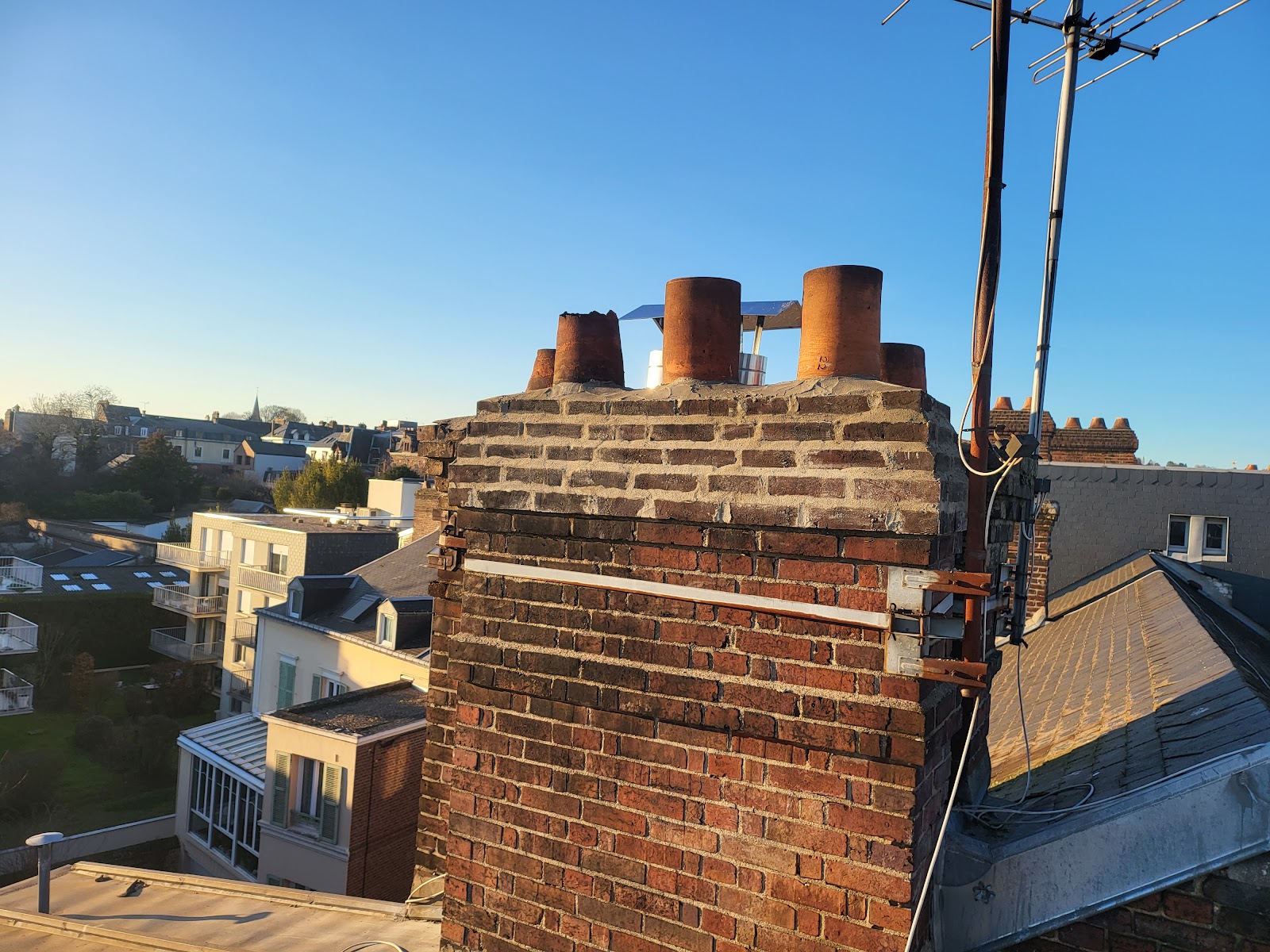 Rénovation de souches de cheminée en briques